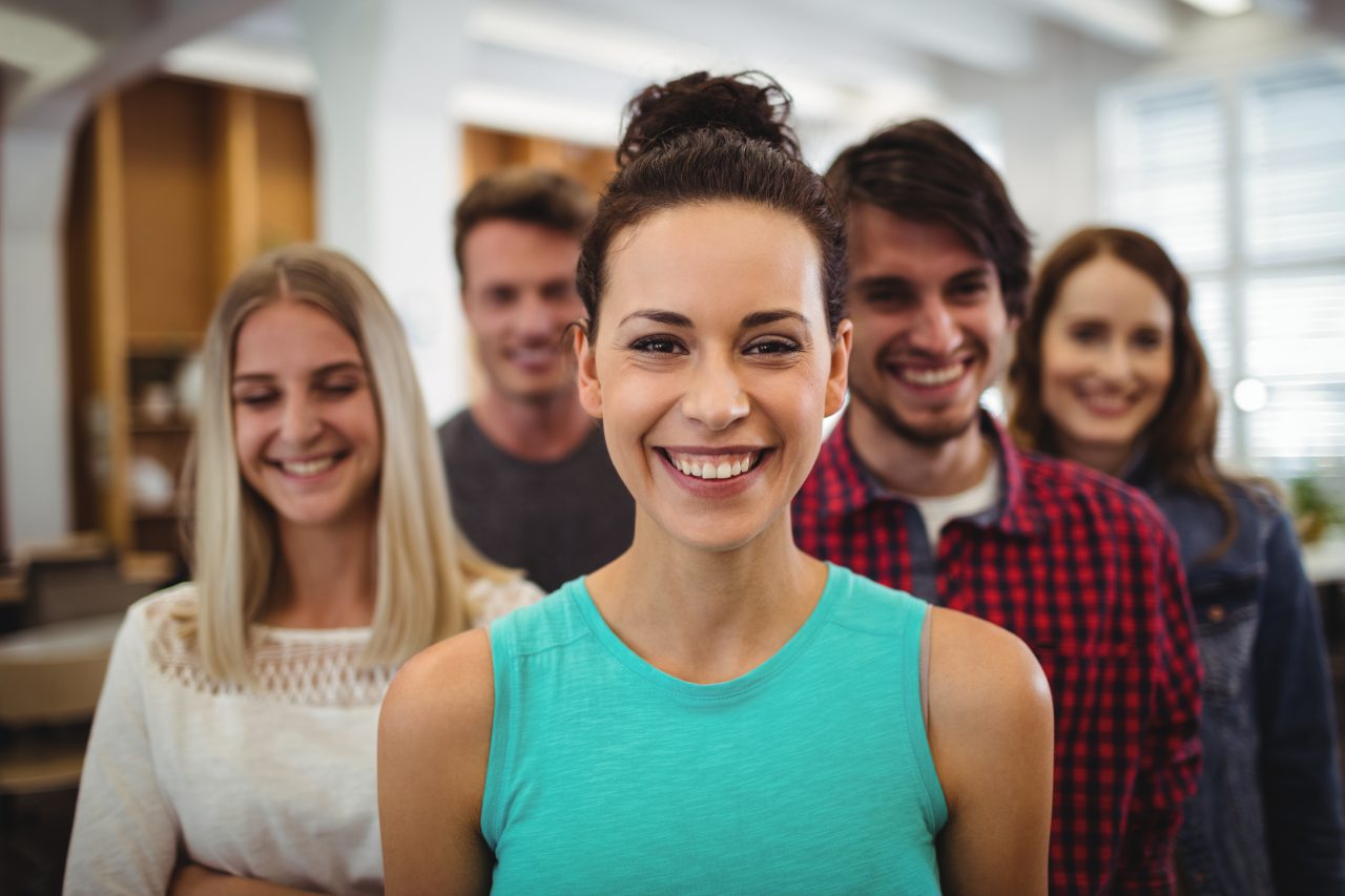 Close-up of happy business executives in office